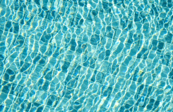 How can you reduce the impact of pool chemicals on the environment in a UK home?