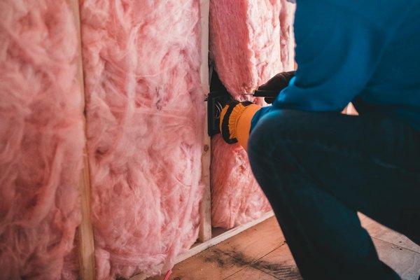 What are the most effective wall insulation materials for a UK 1950s brick home?